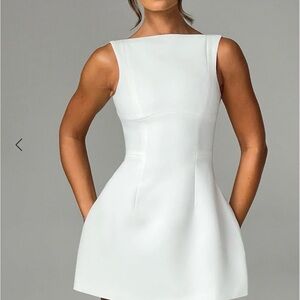 White Sheath Cocktail Dress with Sleeveless Design and Bateau Neckline
